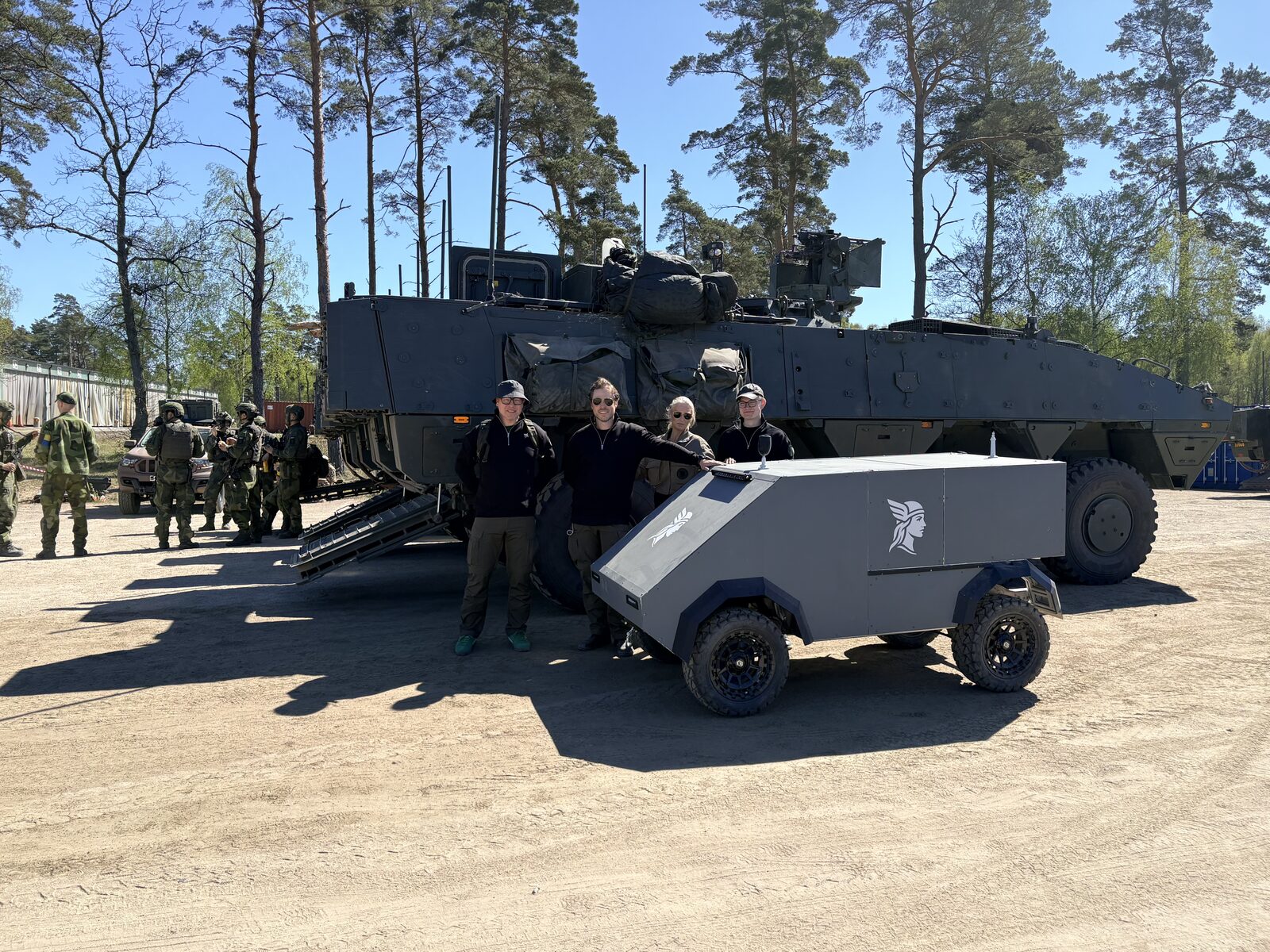 Eira X demonstrator next to a Swedish Armed Forces CV90 with the development team.